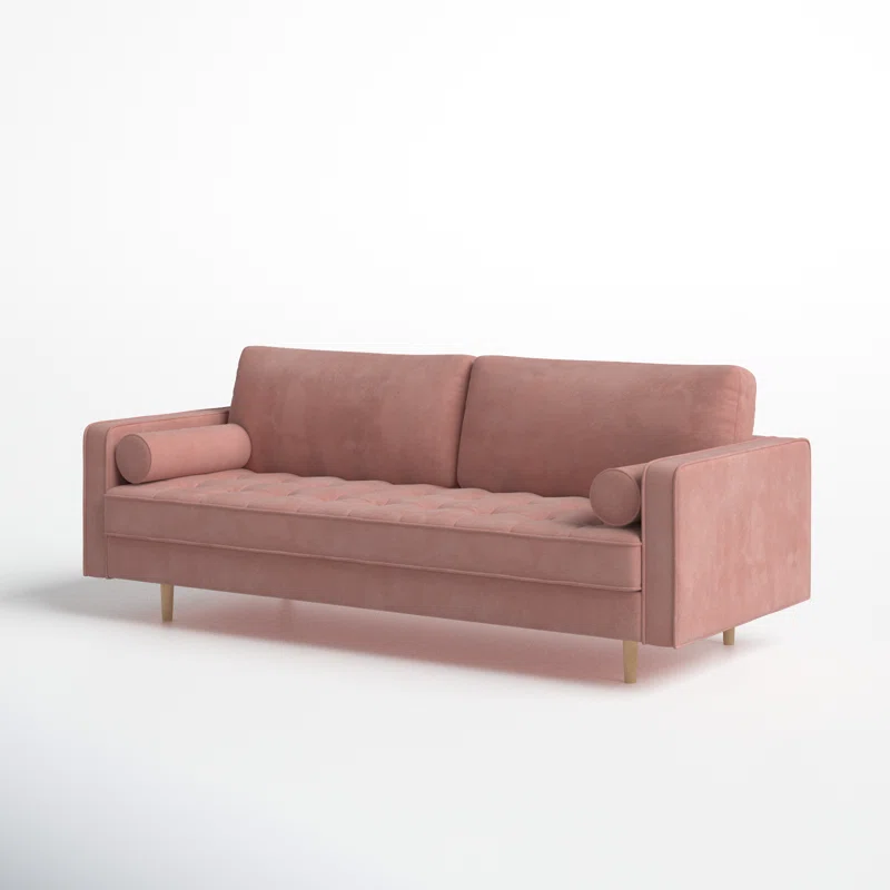 Pink velvet sofa with light wooden legs