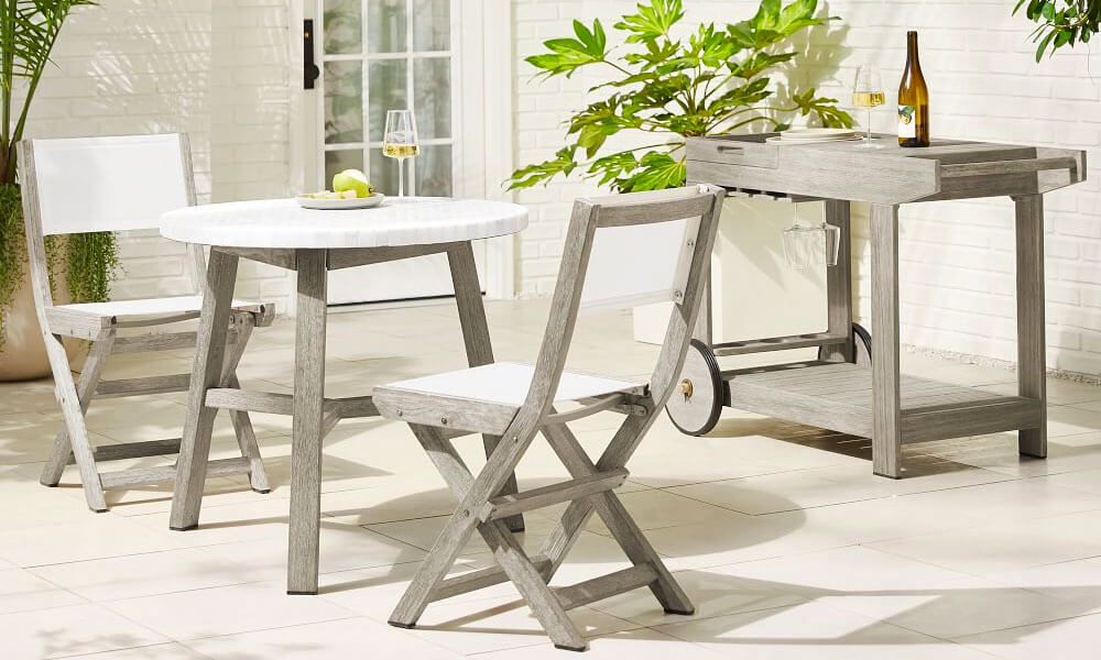 Hardwood table with Pearly ceramic tiles and two hardwood chairs as a bistro set