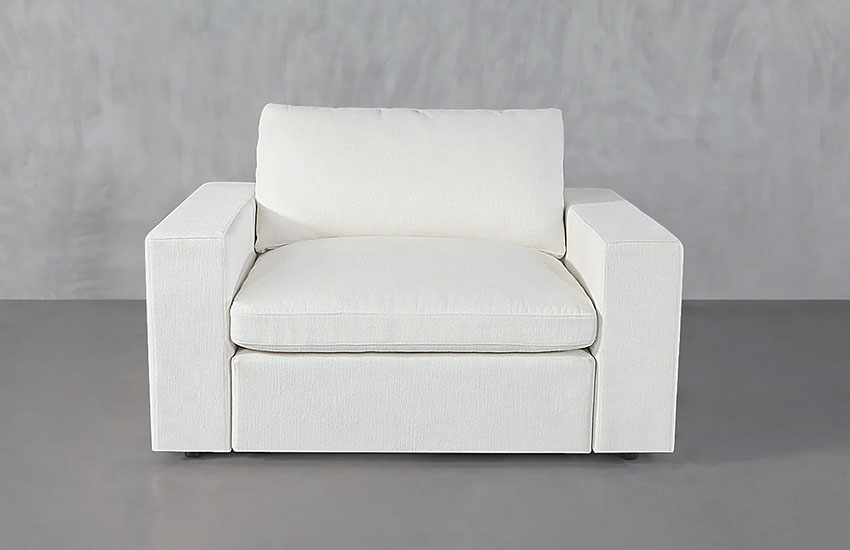 White Upholstered Armchair with comfortable Cushions
