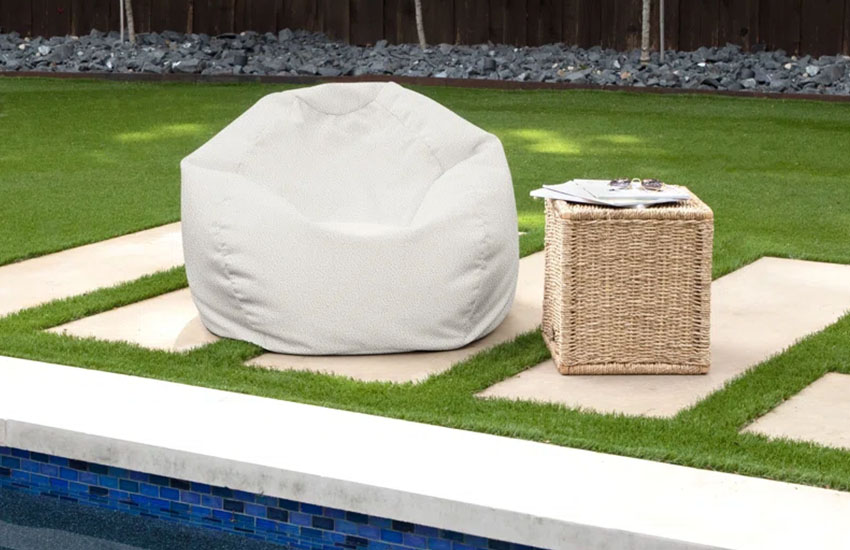 White Bean Bag Chair with ottoman near swimming pool