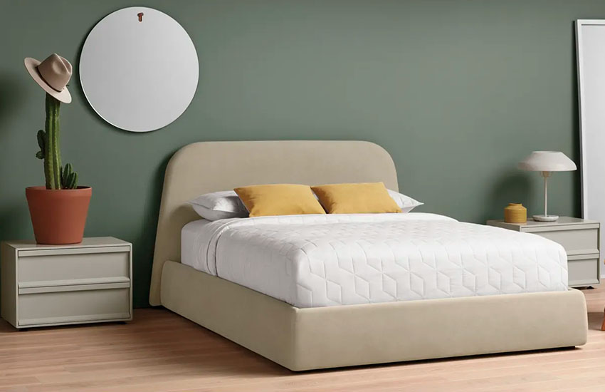 Upholstered Platform Bed with storage. Mattress on the top with beddong and pillows