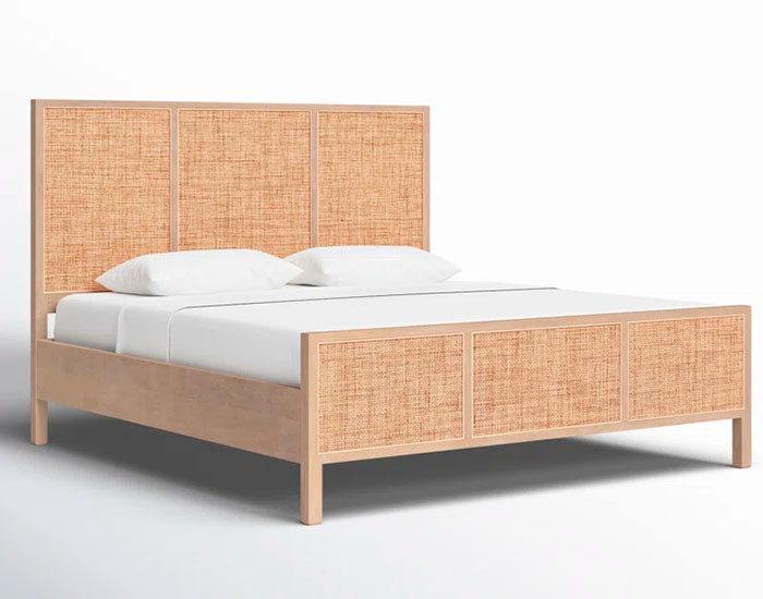 Wooden Platform Bed with a natural woven headboard, a mattress and two white pillows