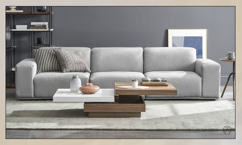 Rectangular Coffee Table with a white lift top and wooden base placed in a light grey rug 