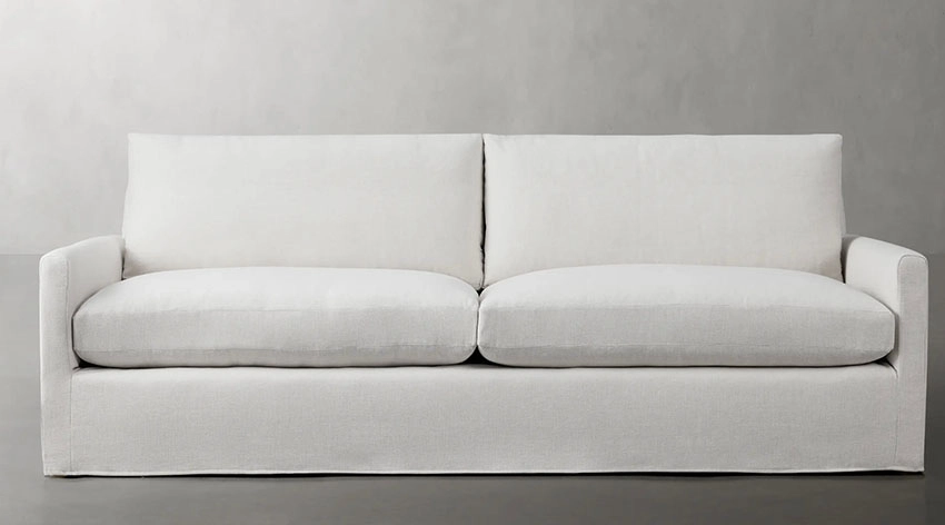 Minimalist white upholstered sofa with no legs