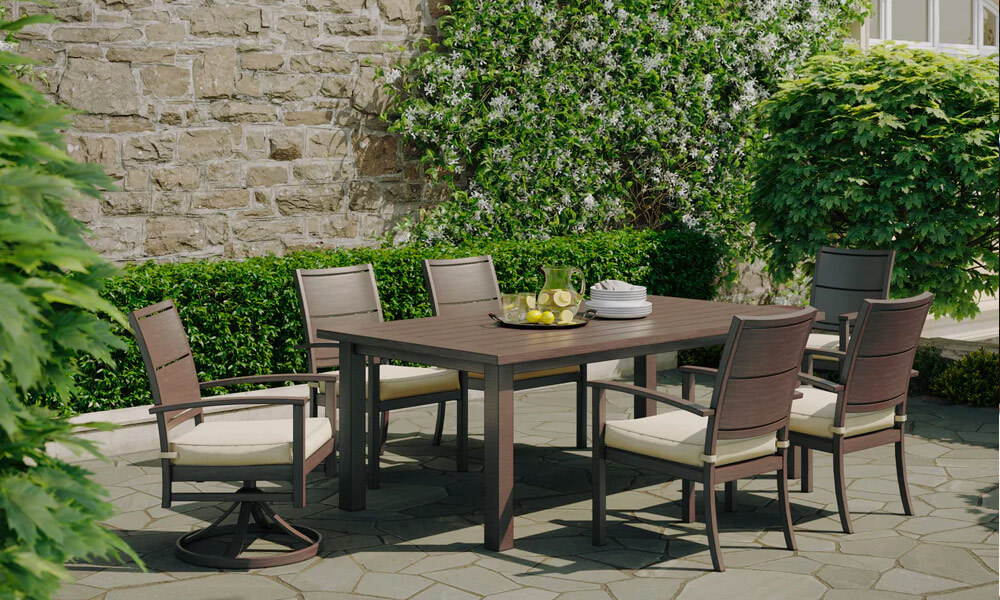 Dark brown outdoor 7-Piece Dining Set with beige cushions in an outdoor space with plants