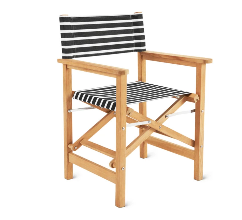 A wooden sun lounge chair in black sand color