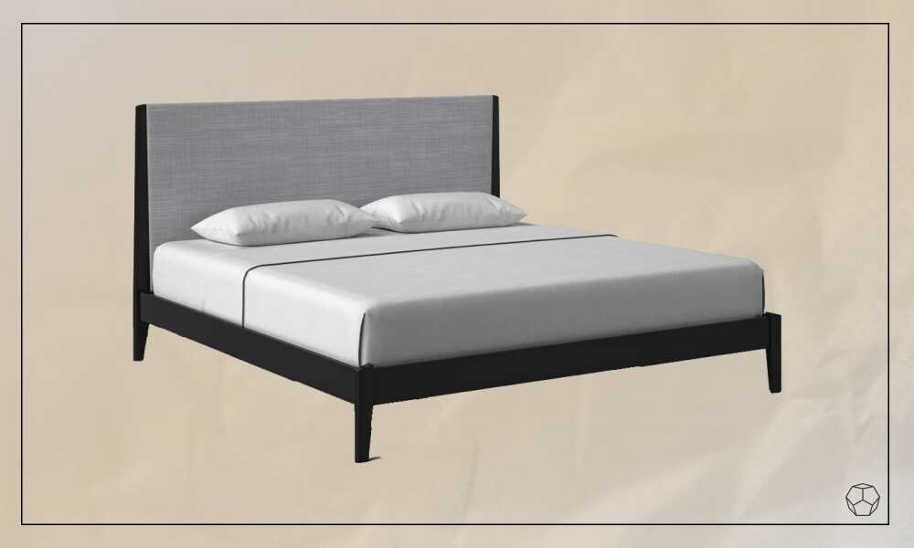 Black framed bed with an upholstered light grey headboard, a mattres with white sheets and pillows
