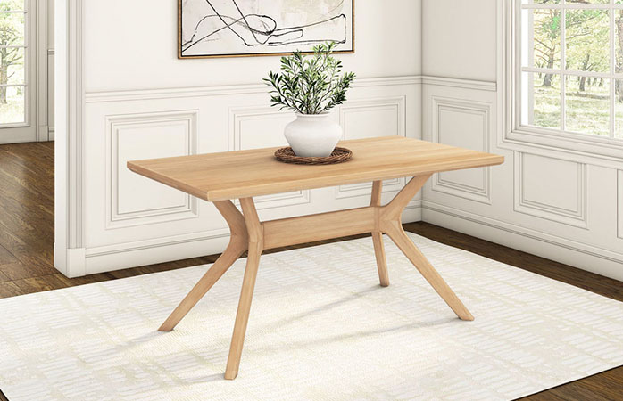 Wooden dining table on white rug