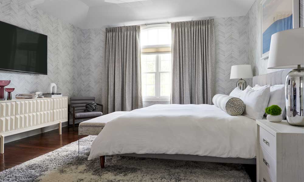 Modern bedroom with a grey palette and modern furniture