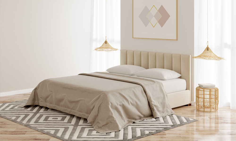 Rug before nightstands in a room with a bed with light beige colors