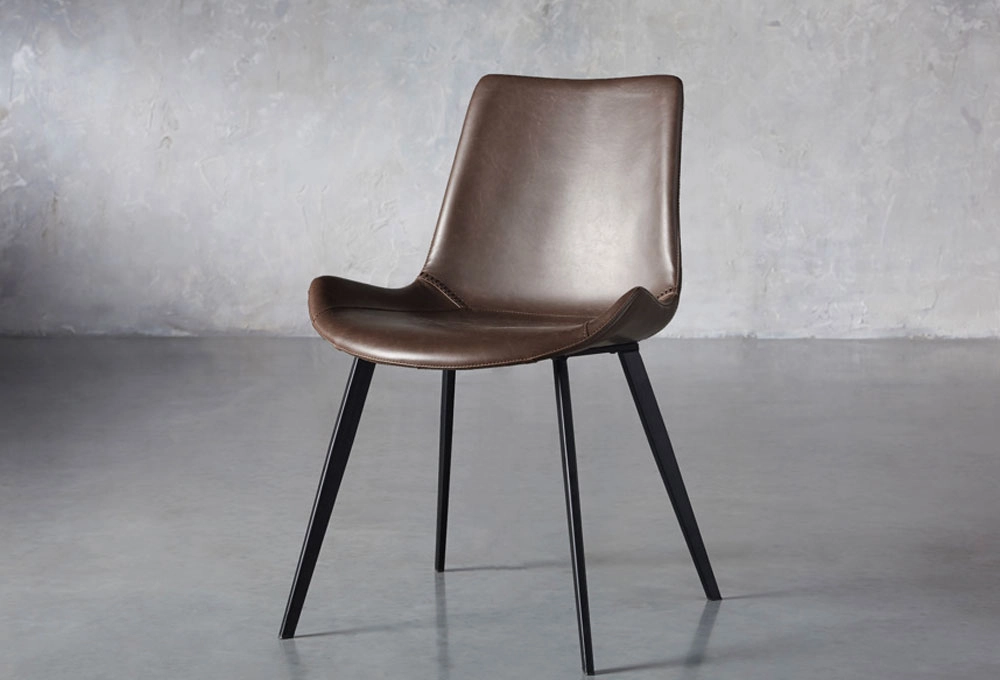 Brown faux leather dining chair with black legs