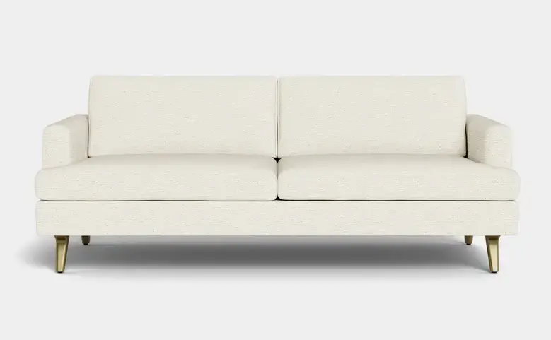 White sofa with golden legs