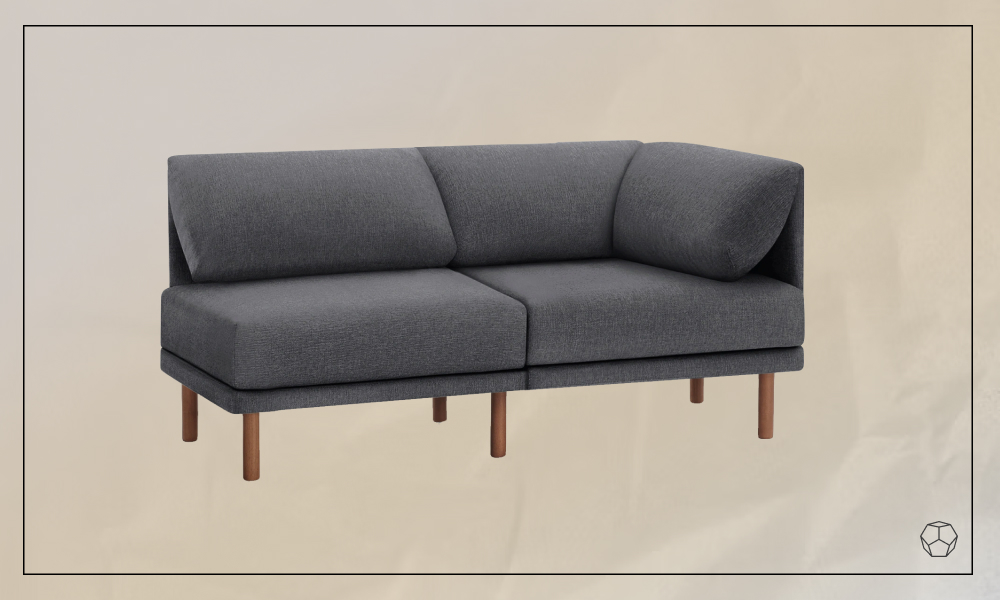 Grey upholstered sofa with wooden legs