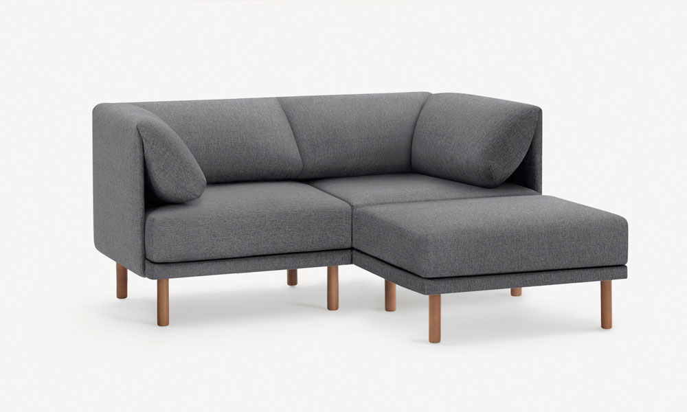 3-Piece Sectional Lounger with grey upholstery with an ottoman