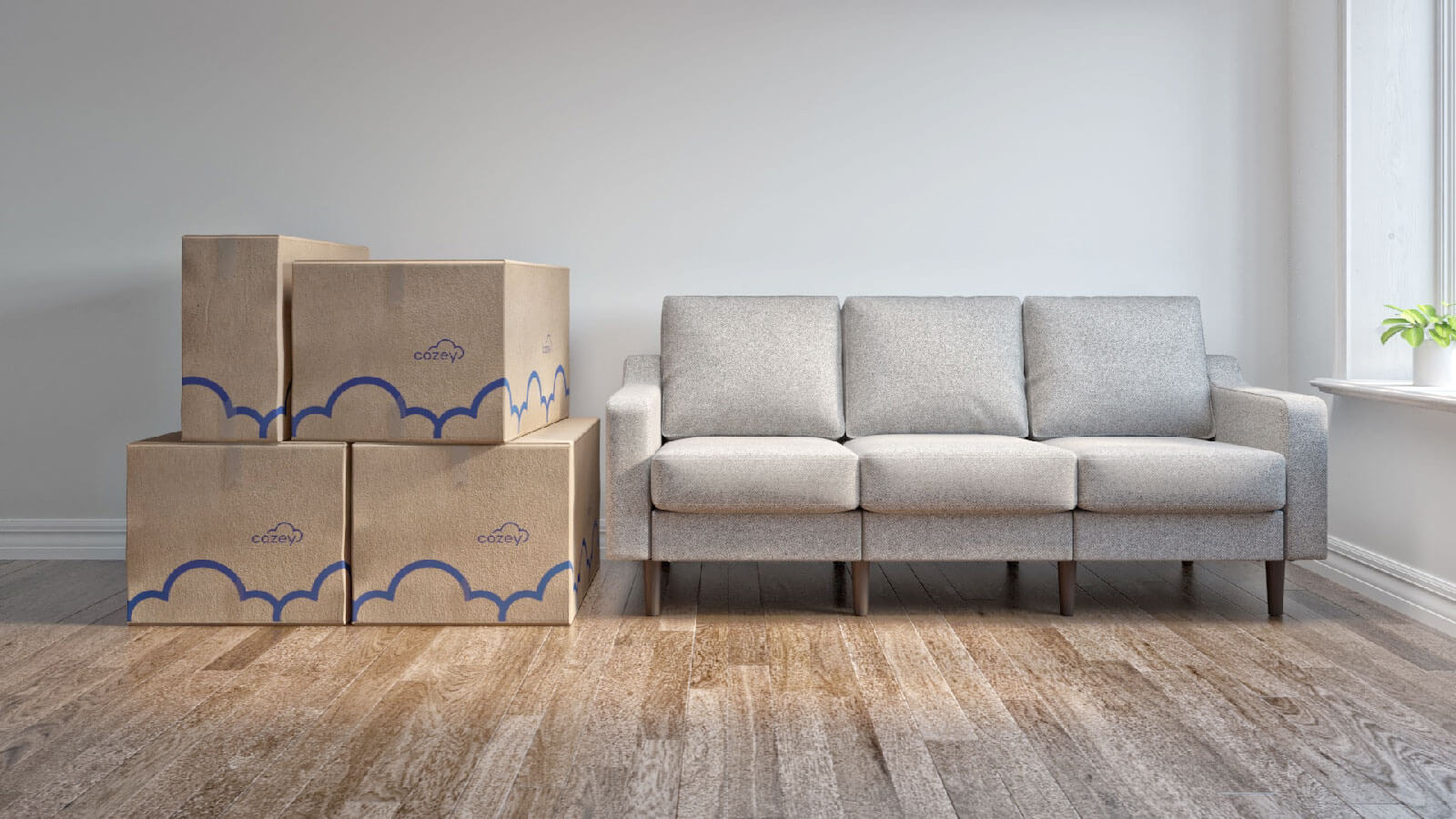 Grey upholstered sofa with wooden legs with four boxes in one side