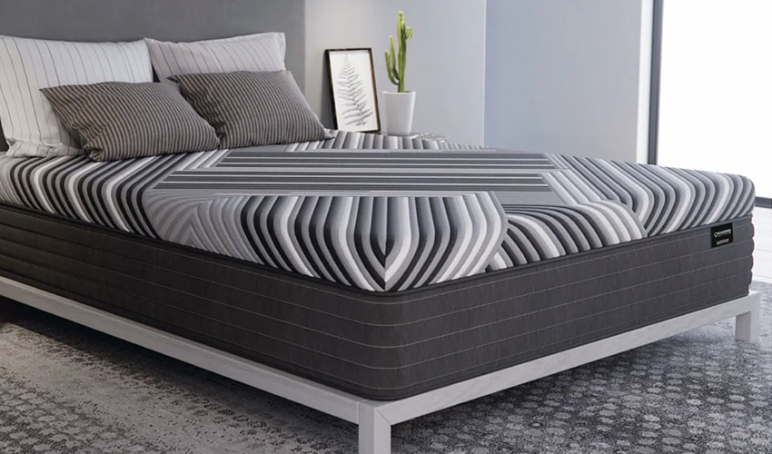 Cozy mattress on a bed with pillows