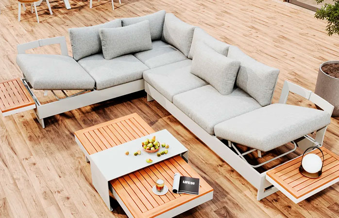 wooden frame sofa set with grey cushions, a coffee table an outdoor space