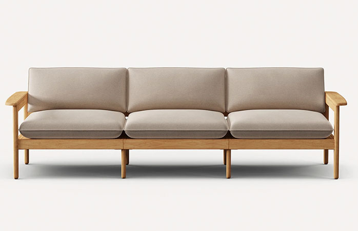 Wooden framed outdoor sofa with light gray cushions