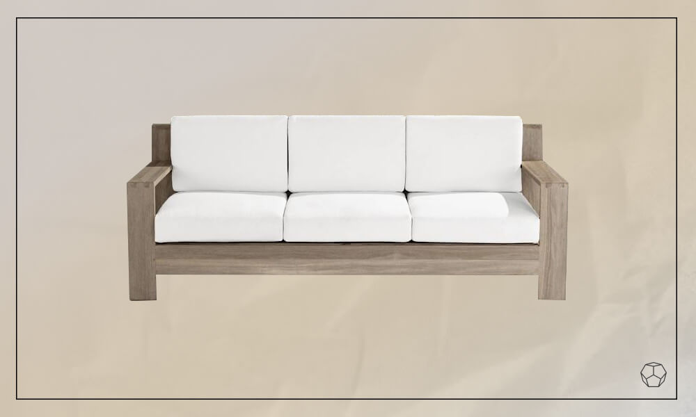 Wooden framed sofa with white cushions