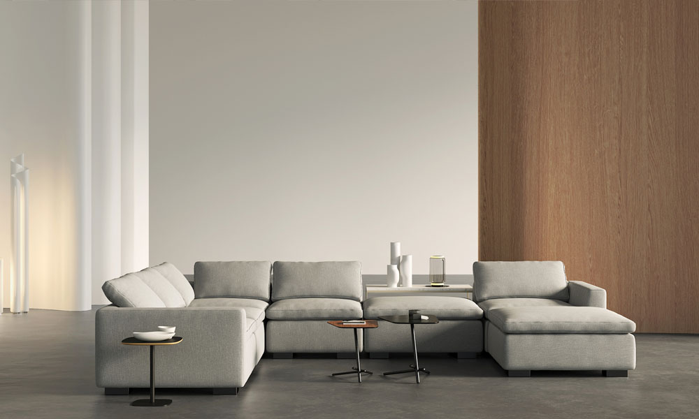Grey Sectional sofa with Chaise in a minimalist living space with sidetables