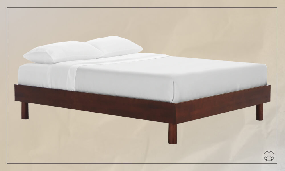 Wooden minimalist bed frame with a mattress and white sheets and pillows