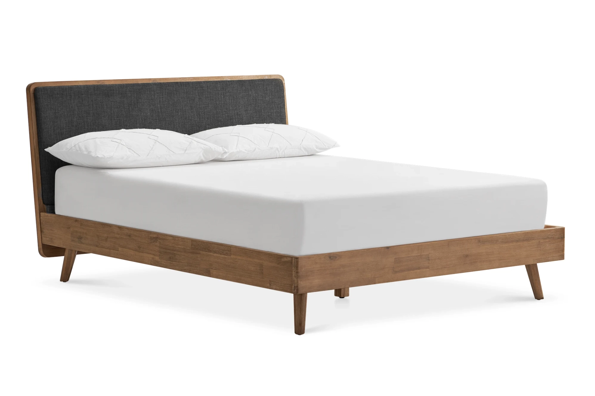 wooden platform bed with wooden legs and a grey headboard. It has a mattress with white sheets