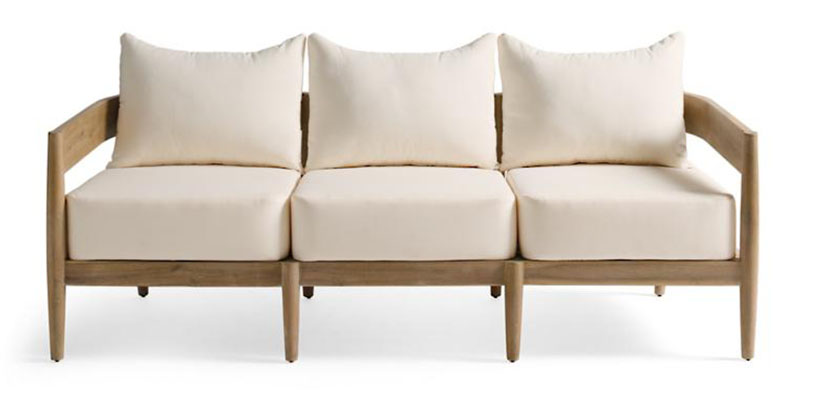 Wooden frame sofa with white cushions