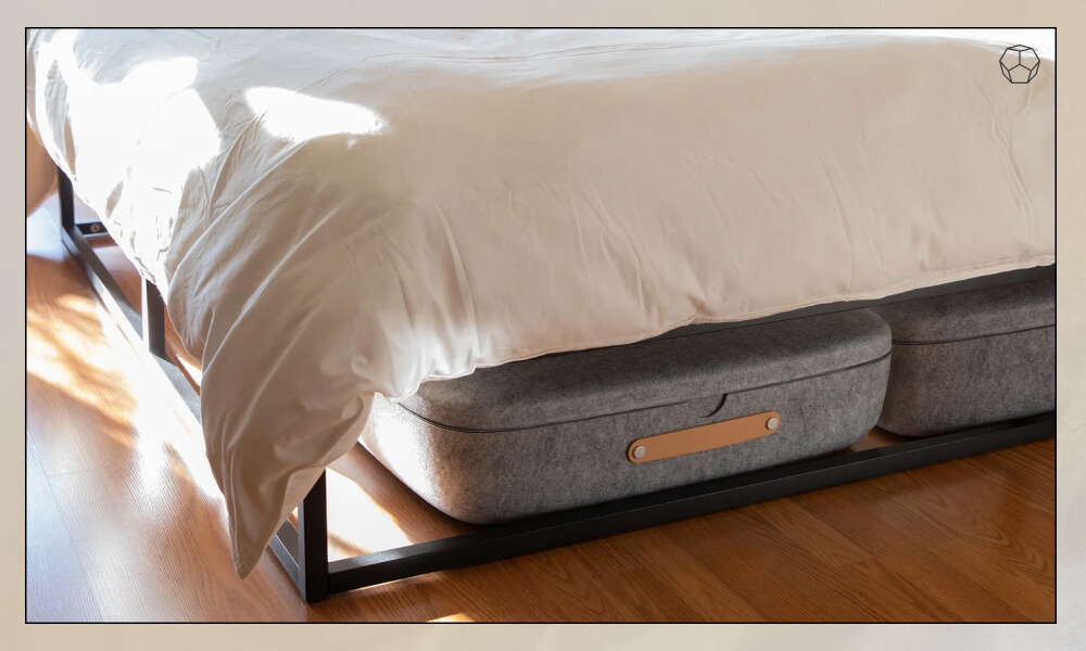 Storage Bins under a black aluminum bed frame
