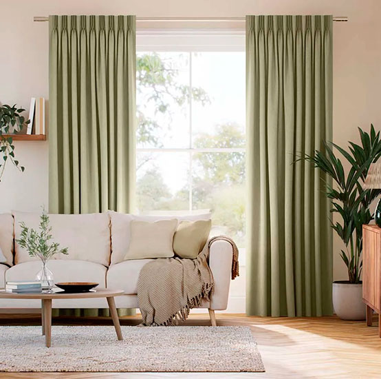 Green Drapery in a room with sofa