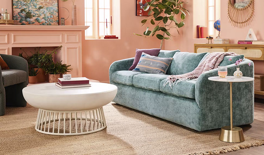 Green Curved Boucle Sofa with a contemporary design, an accent chair, a rounded white coffe table