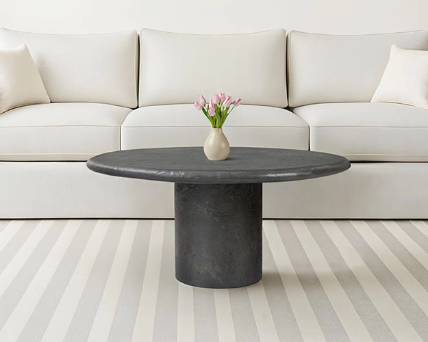 Brown Pedestal and rounded Coffee Table