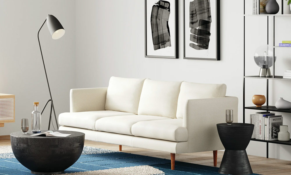 White Upholstered Sofa with wooden legs