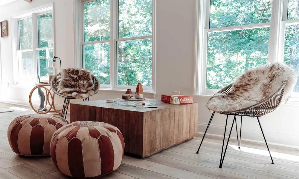 Living room featuring two chairs and a small table in the center