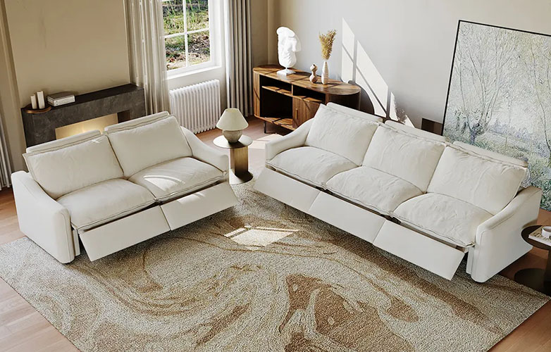 Two power reclining sofas in a living room