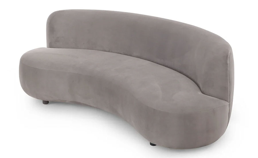 Grey upholstered curved sofa with contemporary curves