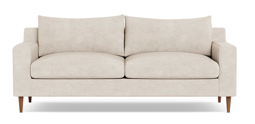 White deep sofa with wooden frame and legs