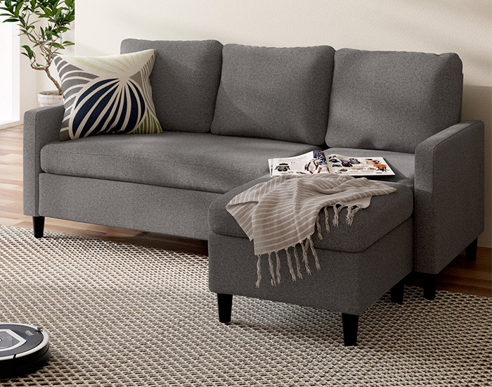 Gray Sectional Sofa with Throw blanket and pillow