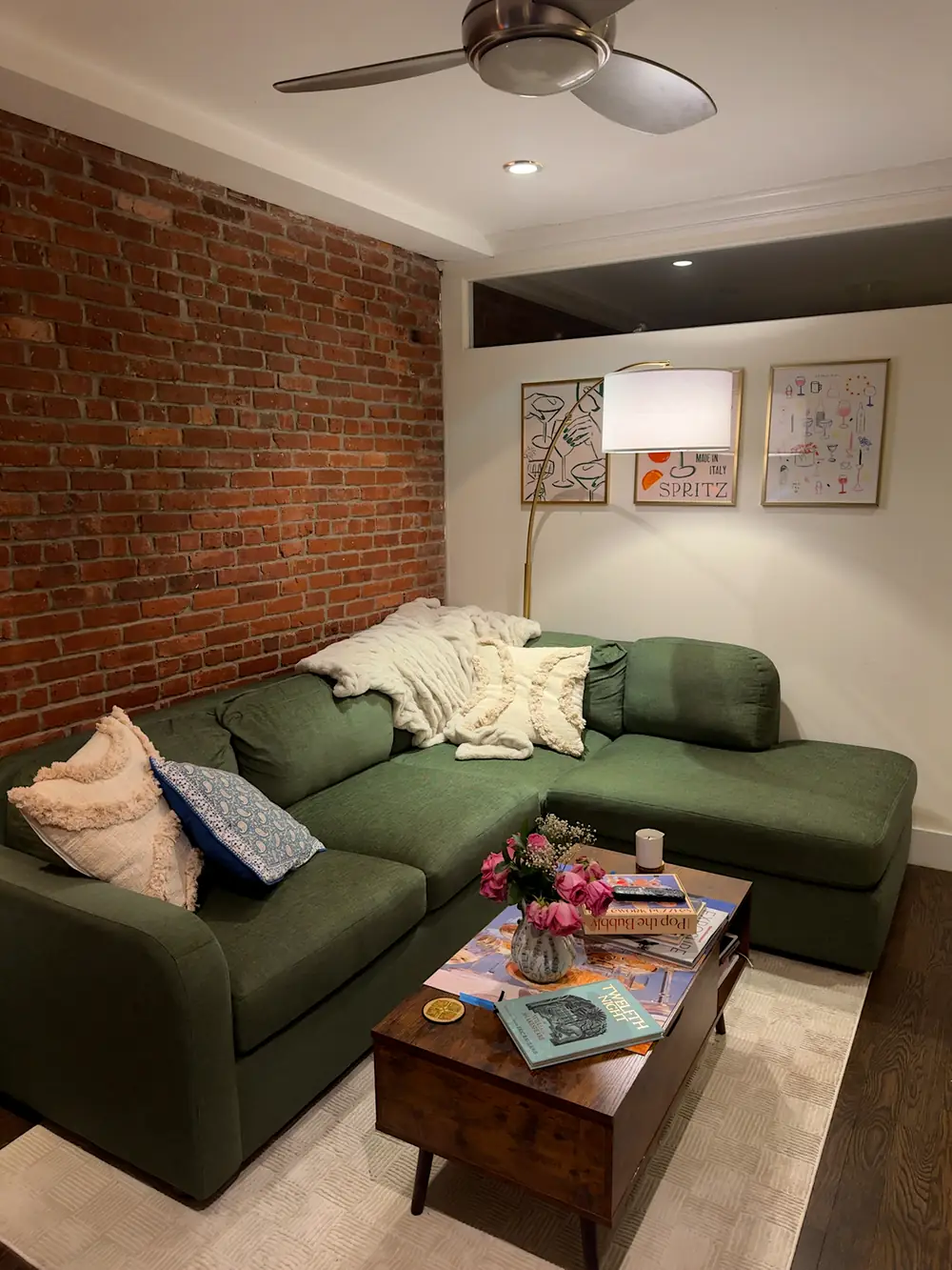 BenchMade Modern Archie Sectional with Bumper in Basil Performance Weave green fabric in a living room