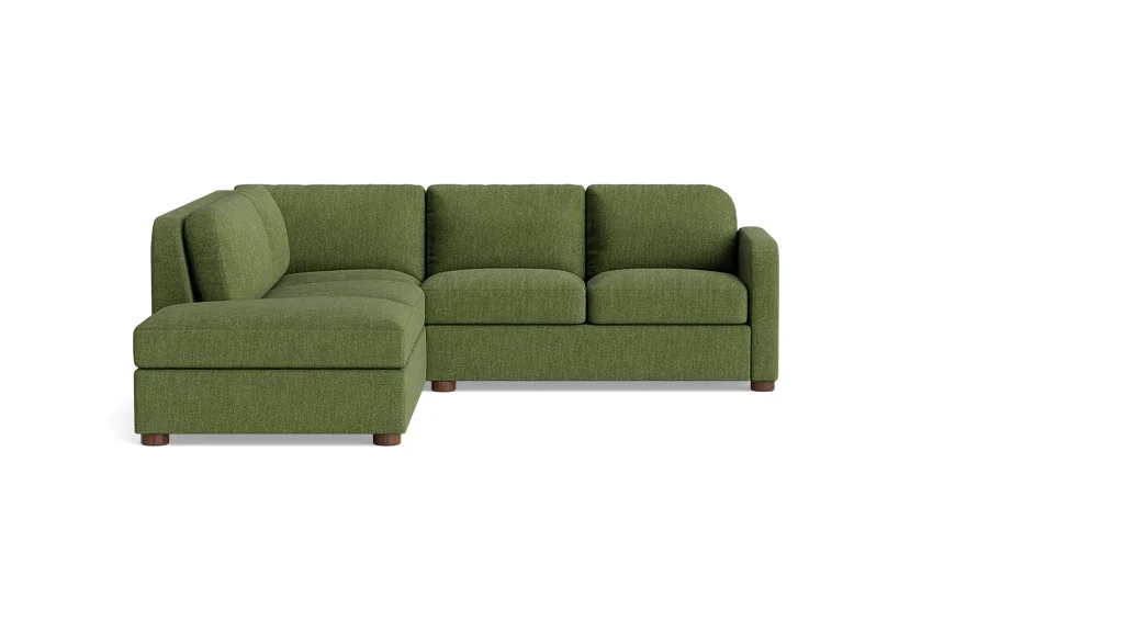 BenchMade Modern Archie Sectional with Bumper in Basil Performance Weave green fabric in a living room