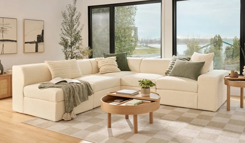 Atmosphere Corner Modular sofa near a window 
