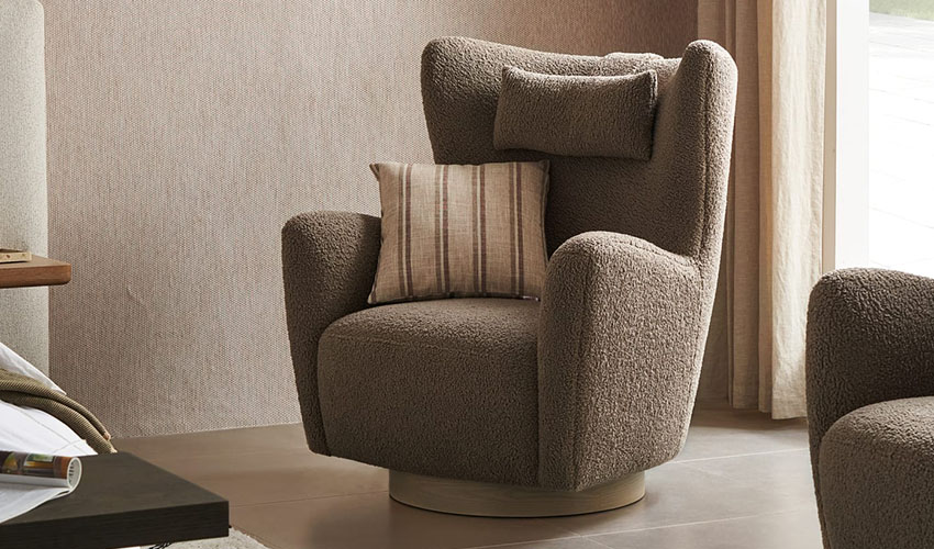 Brown wingback Swivel  chair in a cozy living room