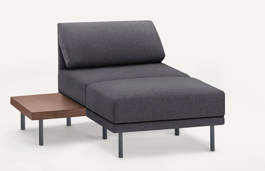 Gray lounge chair with a side table
