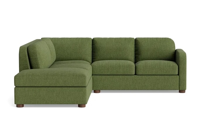 BenchMade Modern Archie Sectional with Bumper in Basil Performance Weave green fabric in a living room