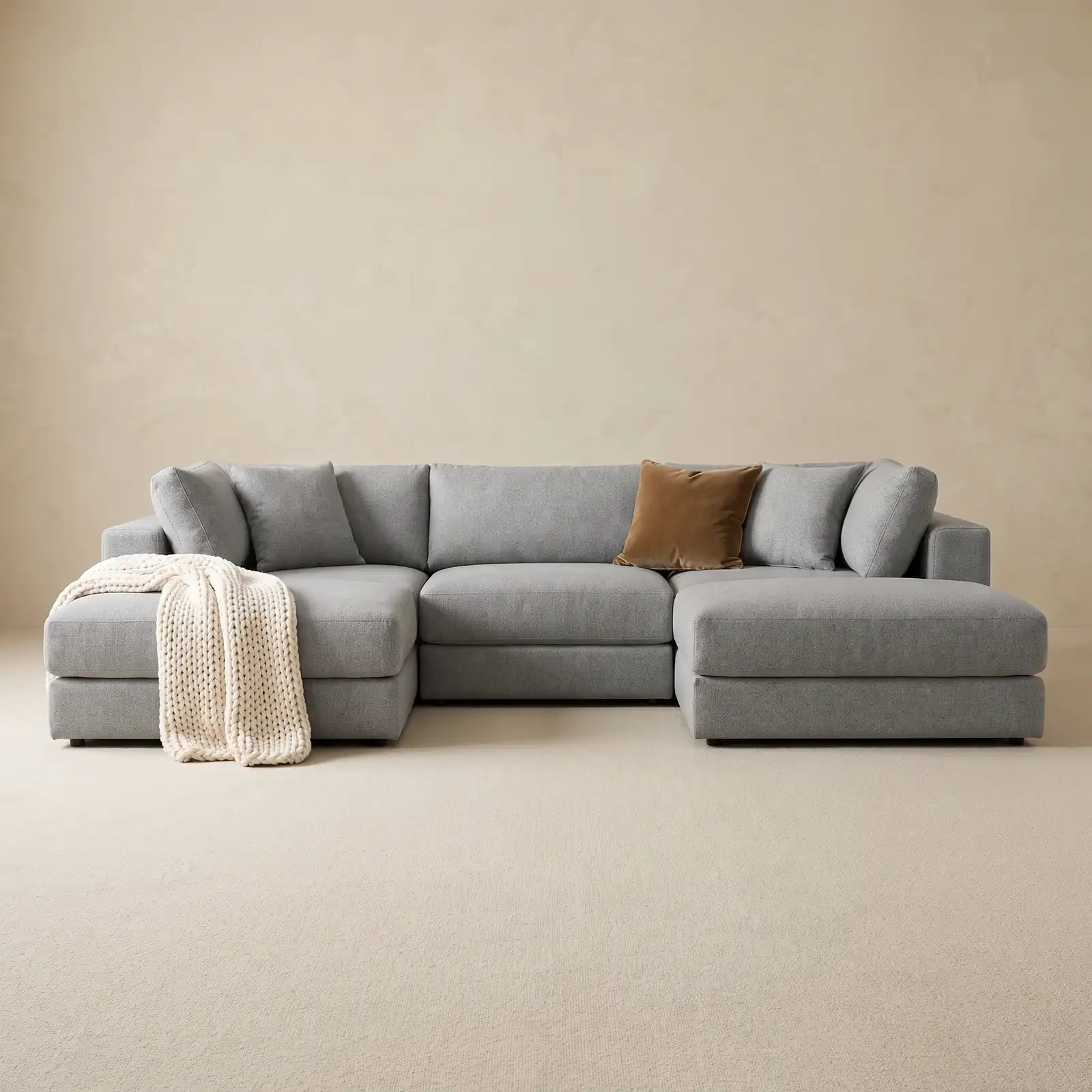 DreamSofa Landon Modular U-sectional in light gray Catalina Steel on a warm putty studio backdrop