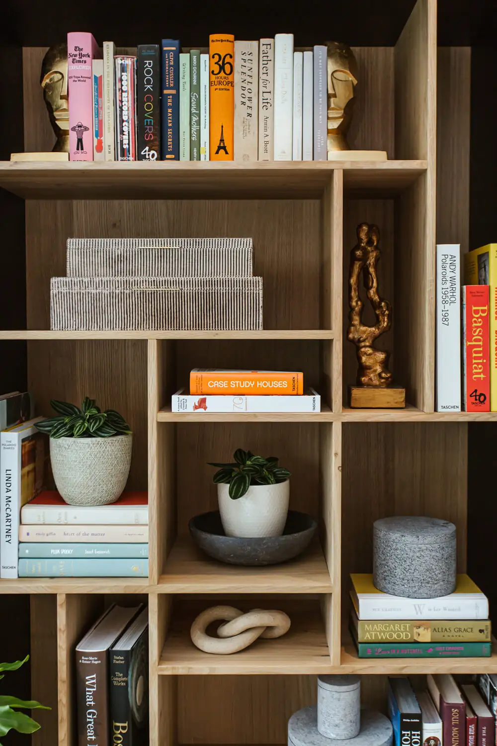 Books on a living room shelf