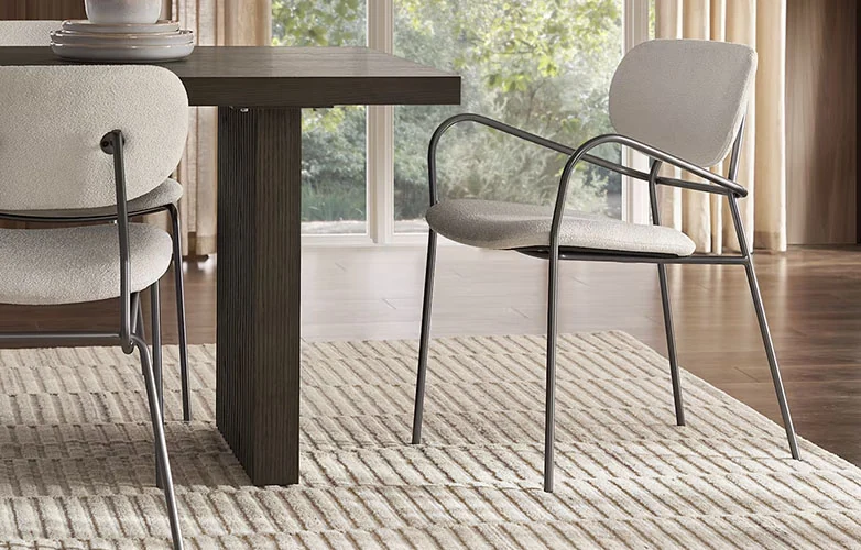 Wool Rug in a dining place with a dining table and chairs