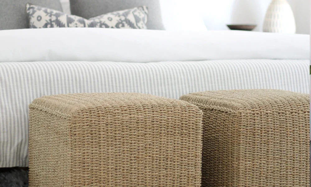 Ottoman by bed
