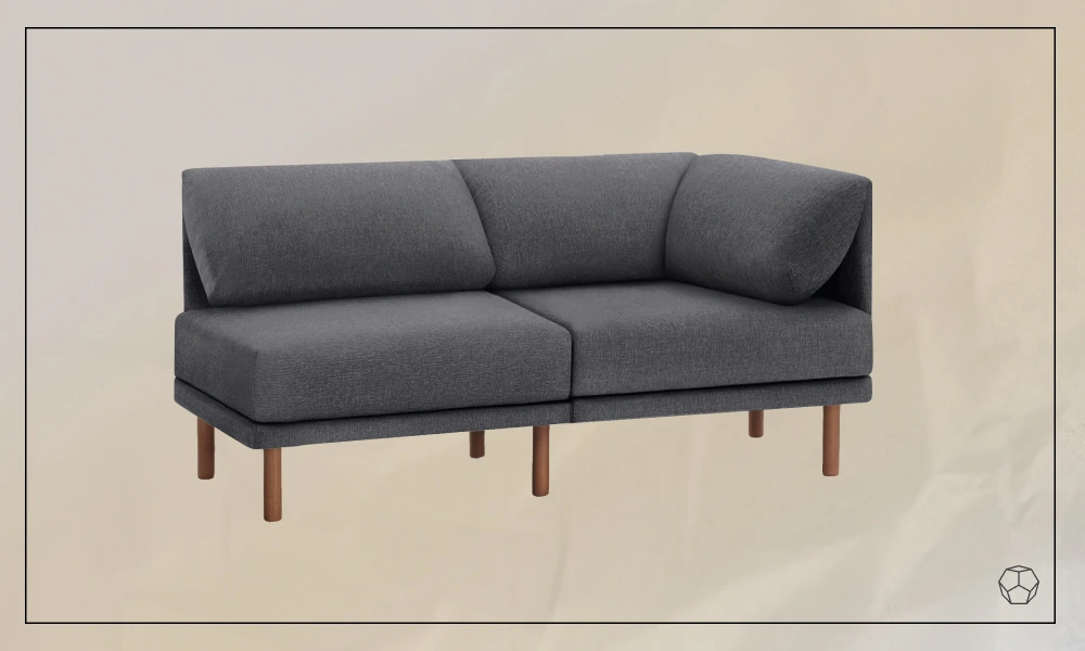 Grey upholstered sofa with wooden legs
