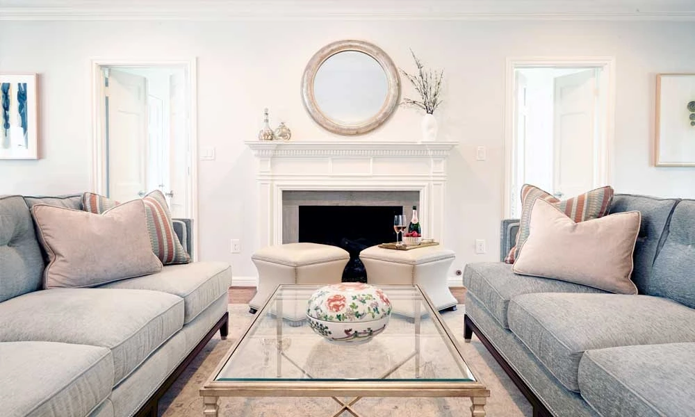 Living room featuring two couches and a coffee table in the center