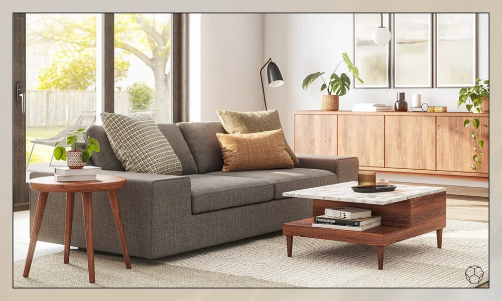 Grey sofa with throw pillows in a cozy living room with a coffee table and a beige rug